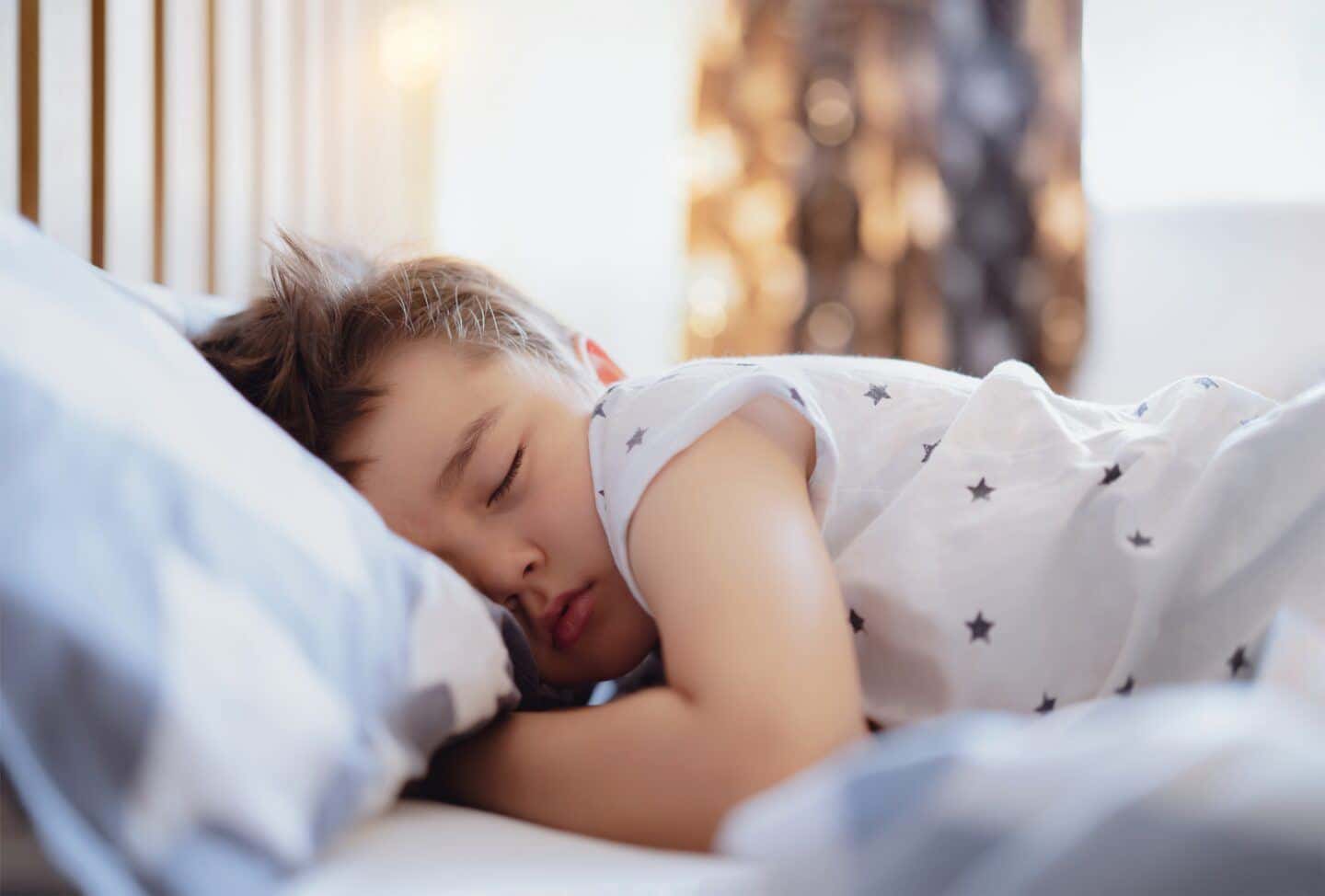 cute-boy-sleeping-on-bed-with-morning-light-lovely-child-get-deep-sleep-while-taking-a-nap-kid-relax_t20_A3QPnr-1440x974.jpg